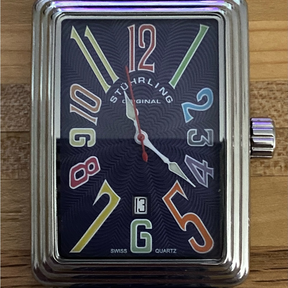 Stuhrling Uptown Ozzie Swiss Quartz Watch with a blue leather strap.